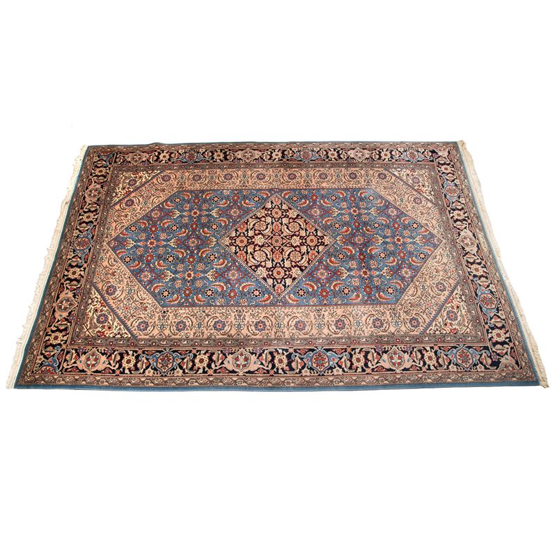 Tappeto persiano, sec. XX, fondo azzurro con medaglione e bordura floreale, cm 300x200